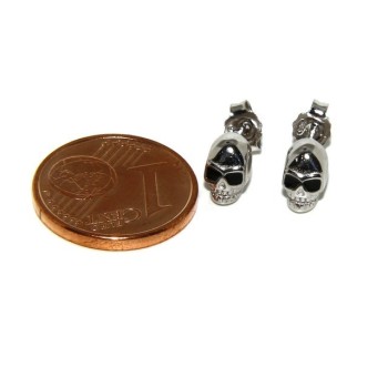 NSA|925: pair of tiny woman Man skulls casting earrings