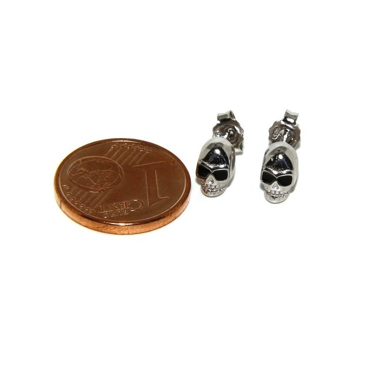NSA|925: pair of tiny woman Man skulls casting earrings