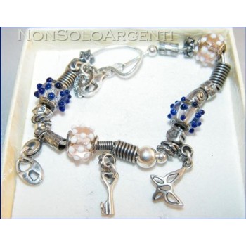 NSA|Argento 925 : bracciale con elementi anticati e 4 biglie di Murano con ciondoli charme