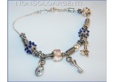 NSA|Argento 925 : bracciale con elementi anticati e 4 biglie di Murano con ciondoli charme