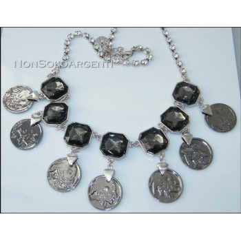 NSA|Bigiotteria : Collana laminata argento rodiata brunita con centrale strass fumè e monete