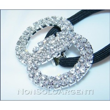 NSA|Bigiotteria : Fermaglio per coda argentato elastico con cerchi e pave' di strass