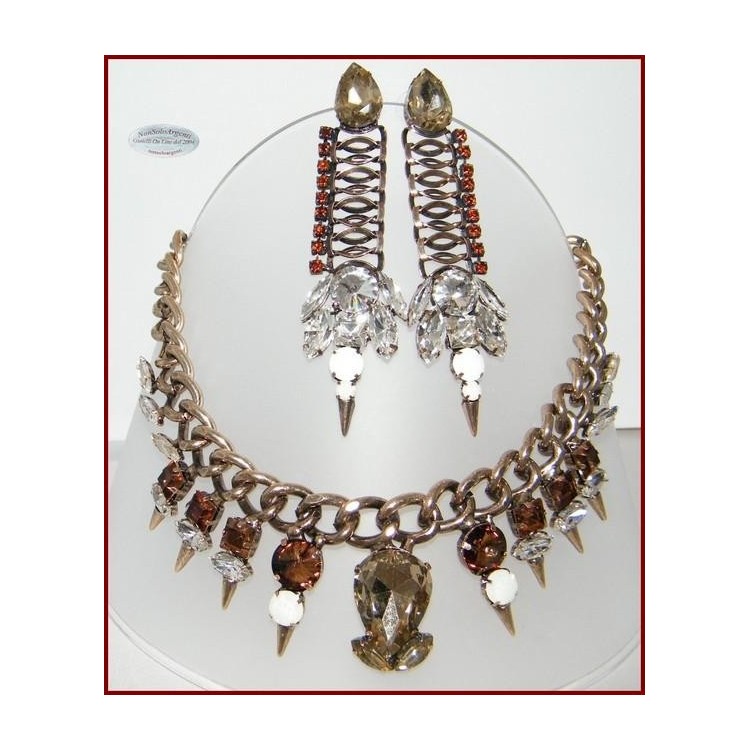 NSA|Bigiotteria : Parure laminata oro scuro a punte con grandi cristalli a goccia fumè