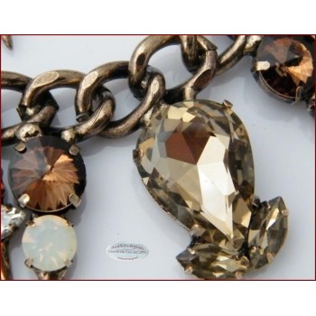 NSA|Jewelery : Pointed dark gold set with large smoky teardrop crystals